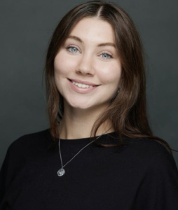 A woman smiling. 